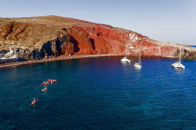 Santorini Guided Sea Kayaking with Light Lunch and Pick-up Option - Lunch at a Family-Run Tavern