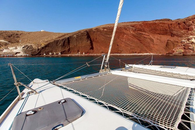 Santorini Half Day Catamaran Private Cruise incl. Meal, Drinks & Free Transport - Palia Kameni, sulfur water, and the volcano area
