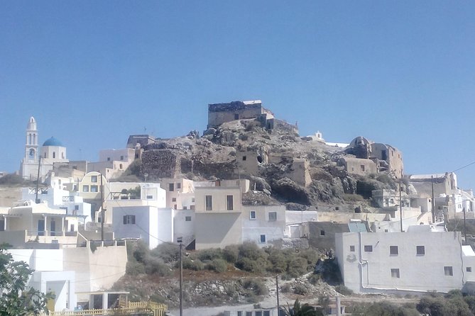 Santorini Highlights and Venetian Castles Small-Group Day Tour - Wine tasting in an old canava