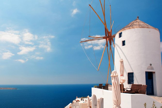 Santorini Highlights and Venetian Castles Small-Group Day Tour - Firostefani and the classic blue-dome photograph