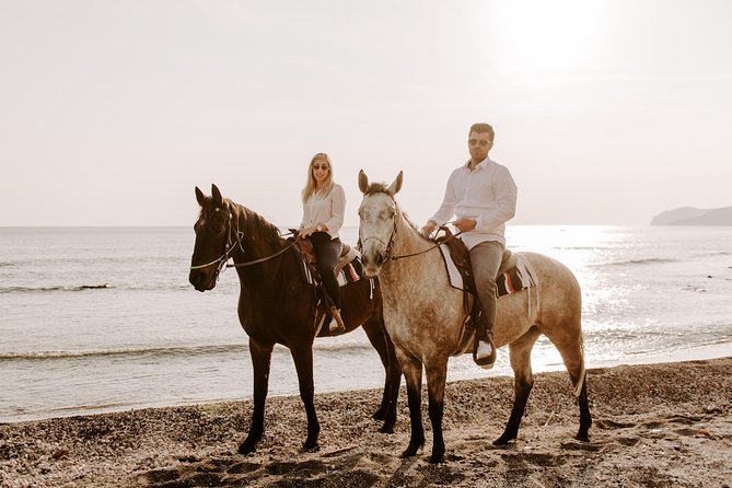 Santorini: Horse Riding to the Black Sandy Beach (Eros beach) - How long is the ride in real terms?