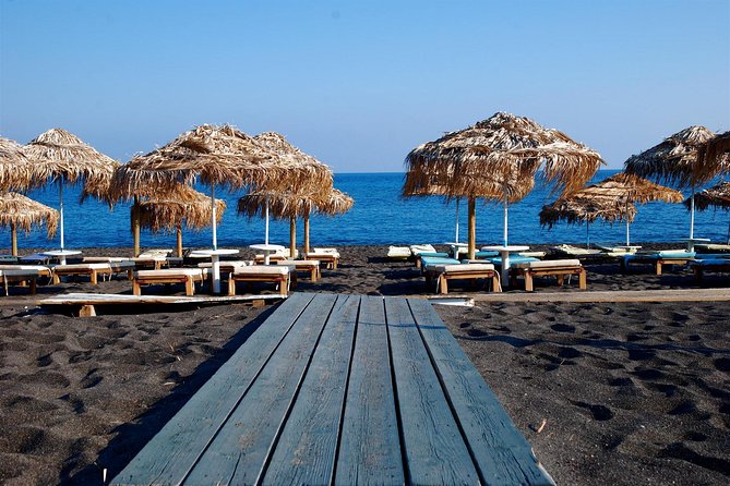 Santorini Island: Guided Tour From Heraklion Crete - What the guide and bus add