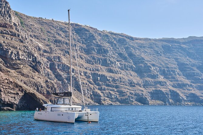 Santorini: Luxury Catamaran Cruise with Fresh Fish BBQ & Drinks - Why a boat trip changes your Santorini day