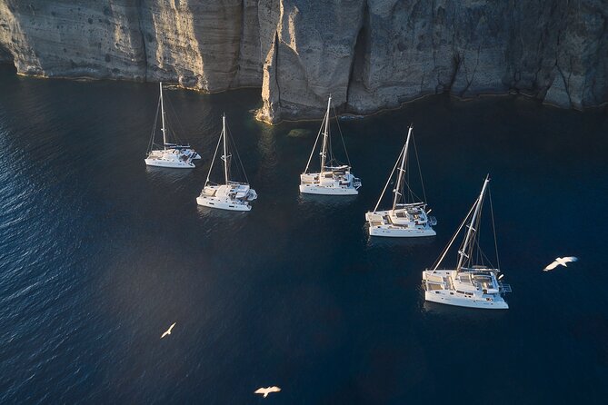 Santorini: Luxury Catamaran Cruise with Fresh Fish BBQ & Drinks - The volcano and the Sulfur Springs
