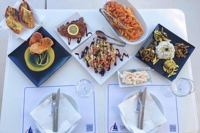 Santorini Luxury Catamaran Day Cruise with BBQ,drinks,transfer - White Beach brings the longest swim and lunch break