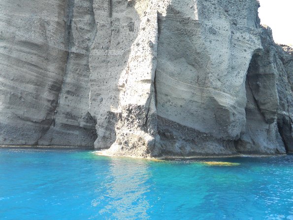 Santorini Luxury Catamaran Sunset Cruise with BBQ, Drink and Transfer - The sunset is the grand finale