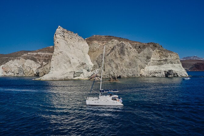Santorini Oia: Luxury Sunset Cruise with Fresh Fish BBQ & Drinks - What this Santorini cruise actually offers