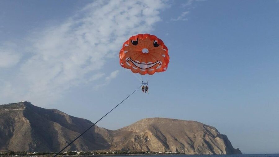 Santorini: Parasailing Flight Experience at Black Beach - The speedboat ride and safety setup