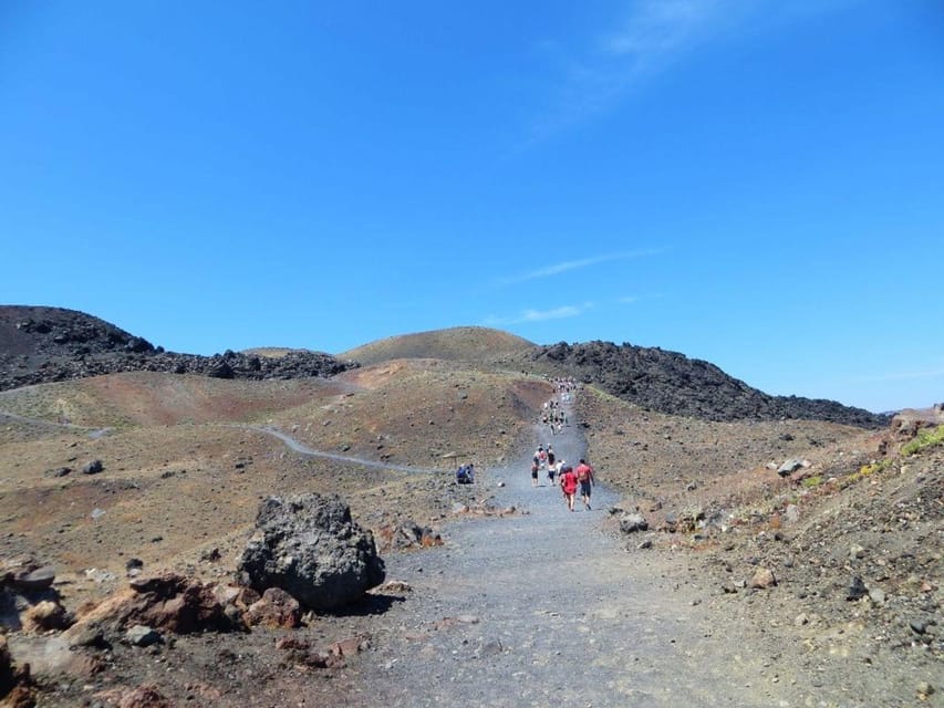 Santorini Port: 3 Hour Cruise to Volcano and Hot Springs - The wooden boat and the ride across the caldera