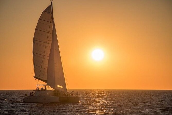 Santorini Private Catamaran Cruise with BBQ, Open Bar & Transfers - White Beach and Mesa Pigadia for swimming