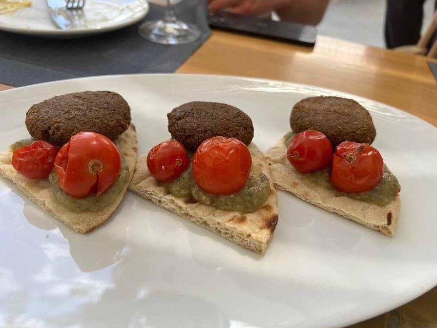 Santorini: Private Cooking Class and Wine Tasting Tour - Visiting two traditional wineries in the countryside