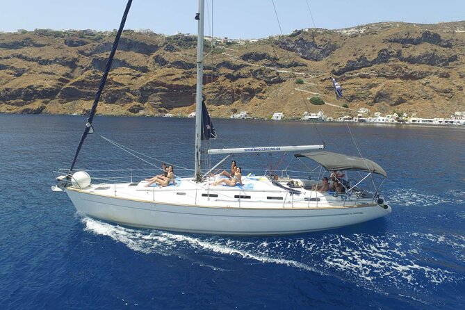 Santorini Private Daytime Sailing Cruise with Meal, Drinks &Transfer included - Captain George and the private crew