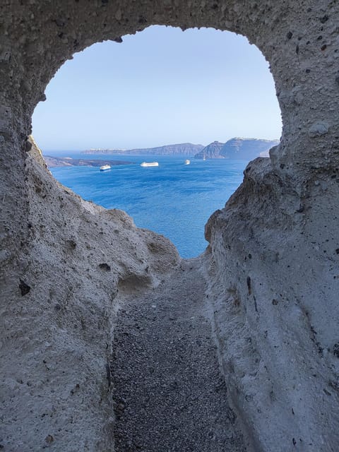 Santorini: Private Sightseeing Tour with Local Guide - Oia Castle and Ammoudi Bay below the cliffs