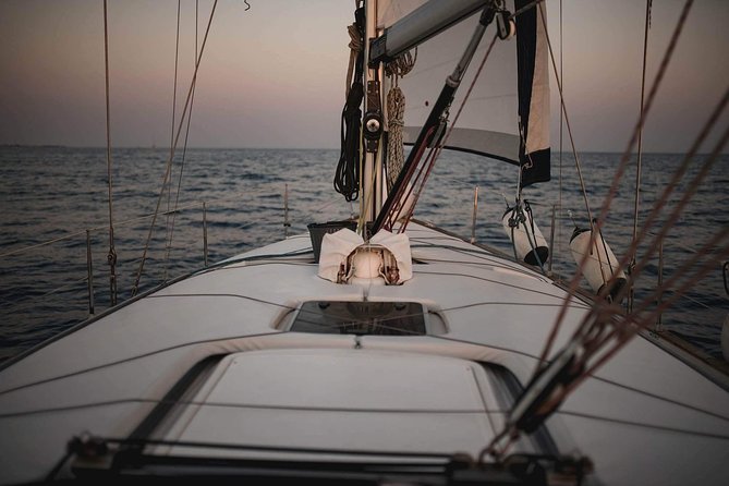 Santorini Private Sunset Sailing Tour with Dinner, Drinks &Transfer included - Thirassia Island, swimming, and dinner on board