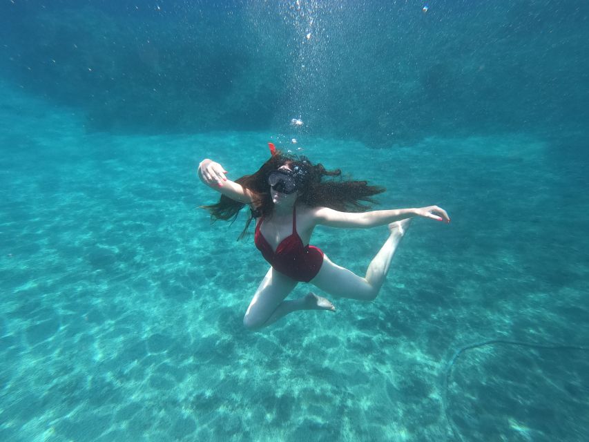 Santorini: Sea Caves Kayak Trip with Snorkeling and Picnic - The Akrotiri coast, one paddle at a time