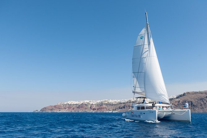 Santorini Small-Group Catamaran Sailing Trip(BBQ,drinks, transfer) - Afternoon Departures and Sunset Light