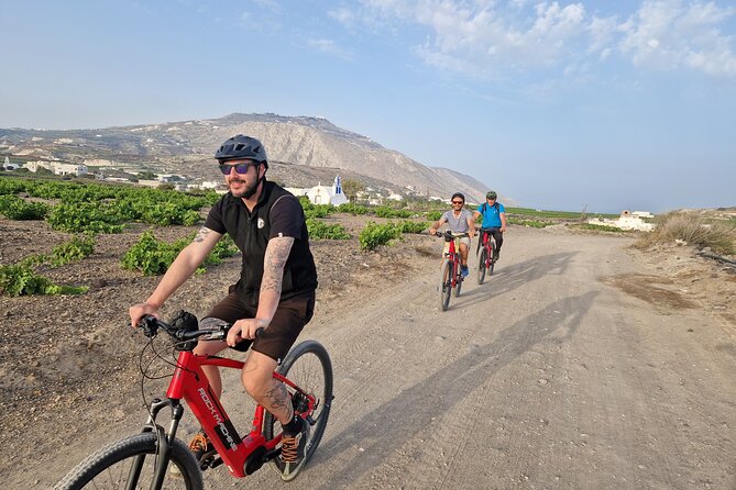 Santorini Small Group Guided E-bike Tour & Local Tomato Museum - Black sand and the southern coast at Perissa