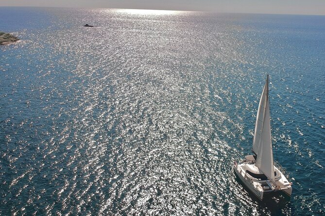 Santorini: Standard Small-Group Catamaran Cruise with Food/Drinks - Who Will Get the Most Value From the $102.58 Price