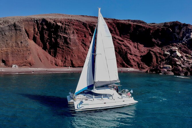 Santorini: Standard Small-Group Catamaran Cruise with Food/Drinks - Red Beach: Volcanic Cliffs and a Short First Swim