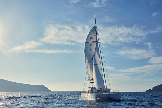 Santorini Sunset Luxury Sailing Catamaran Cruise with BBQ, drinks, transfer - Choosing the afternoon or sunset departure