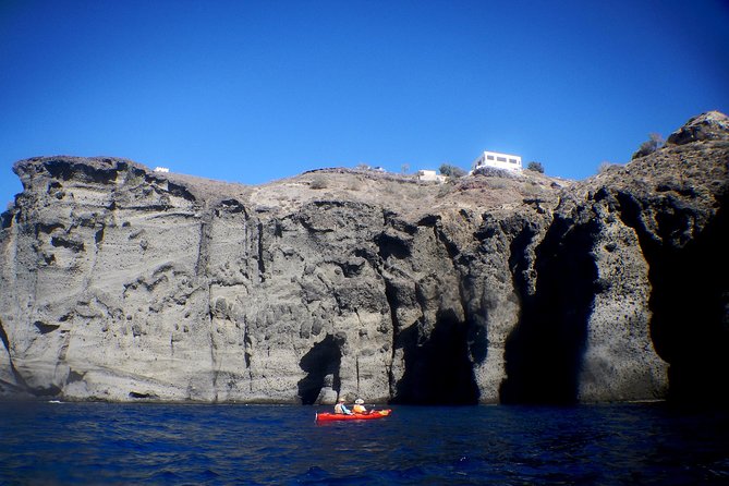 Santorini: Sunset Sea Kayak with Light Dinner with Pick-up Option - Dinner at a Local Tavern