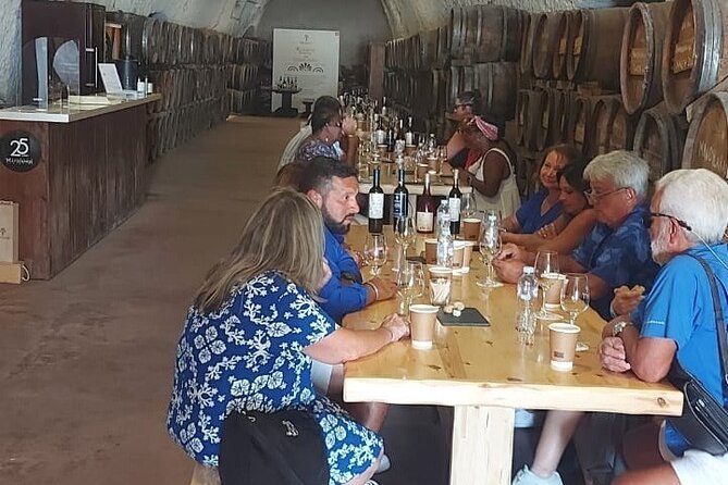 Santorini Wine Tour with sunset in Oia - Transport, timing, and group size
