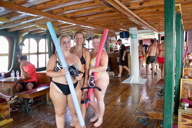 Sun & Sea 6 Hour All Inclusive Swimming Cruise with Greek BBQ & Unlimited Drinks - Traganou Beach: caves and a small beach