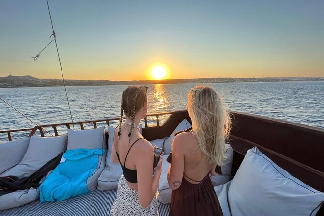 Sunset Cruise with Greek BBQ & Unlimited Aperol Spritz, Beer Wine - Leaving Rhodes harbor beside the old town walls