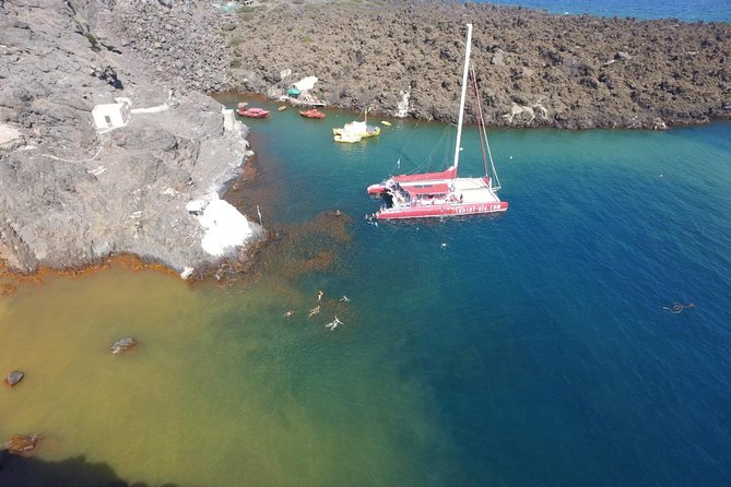 Sunset Sailing Catamaran Cruise in Santorini with BBQ and Drinks - White Beach, barbecue, and the longest stop
