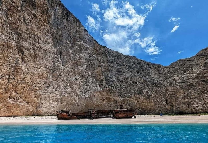 Zakynthos: Blue Caves and Navagio Bay Swim Cruise - Leaving Agios Nikolaos for the northern coast