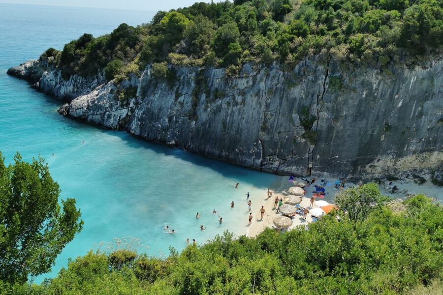 Zakynthos Small Group Tour Shipwreck & Blue Caves Land & Sea - Navagio viewpoint shows the famous beach from above