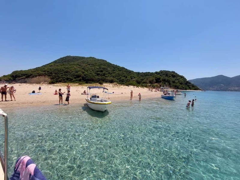 Zakynthos: Sunset Cruise to Myzithres with Wine - Guide languages, transfers, and booking flexibility