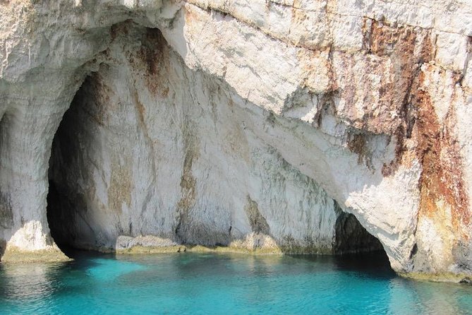 Zante Cruise to Blue Caves & Shipwreck Beach Photo stop - Swimming in clear water before the ride home